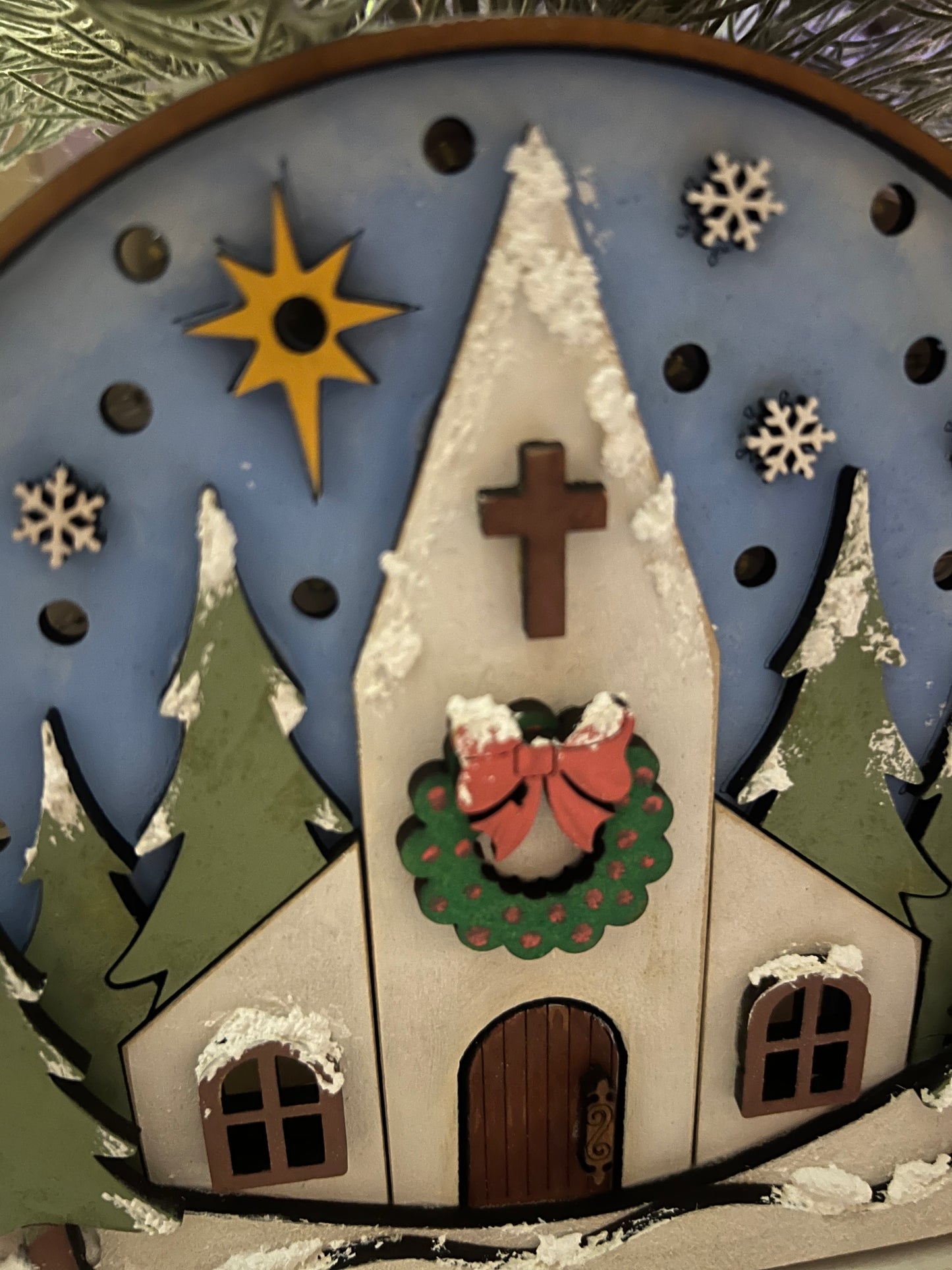 Snowy church with lights shelf sitter.